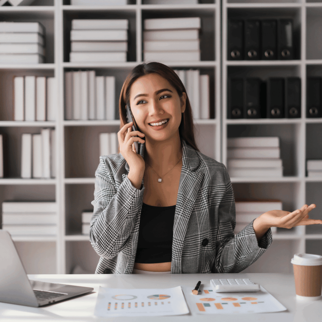 registered dietitian nutritionist sitting at desk, talking on phone